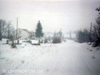 Sne i en de landsby